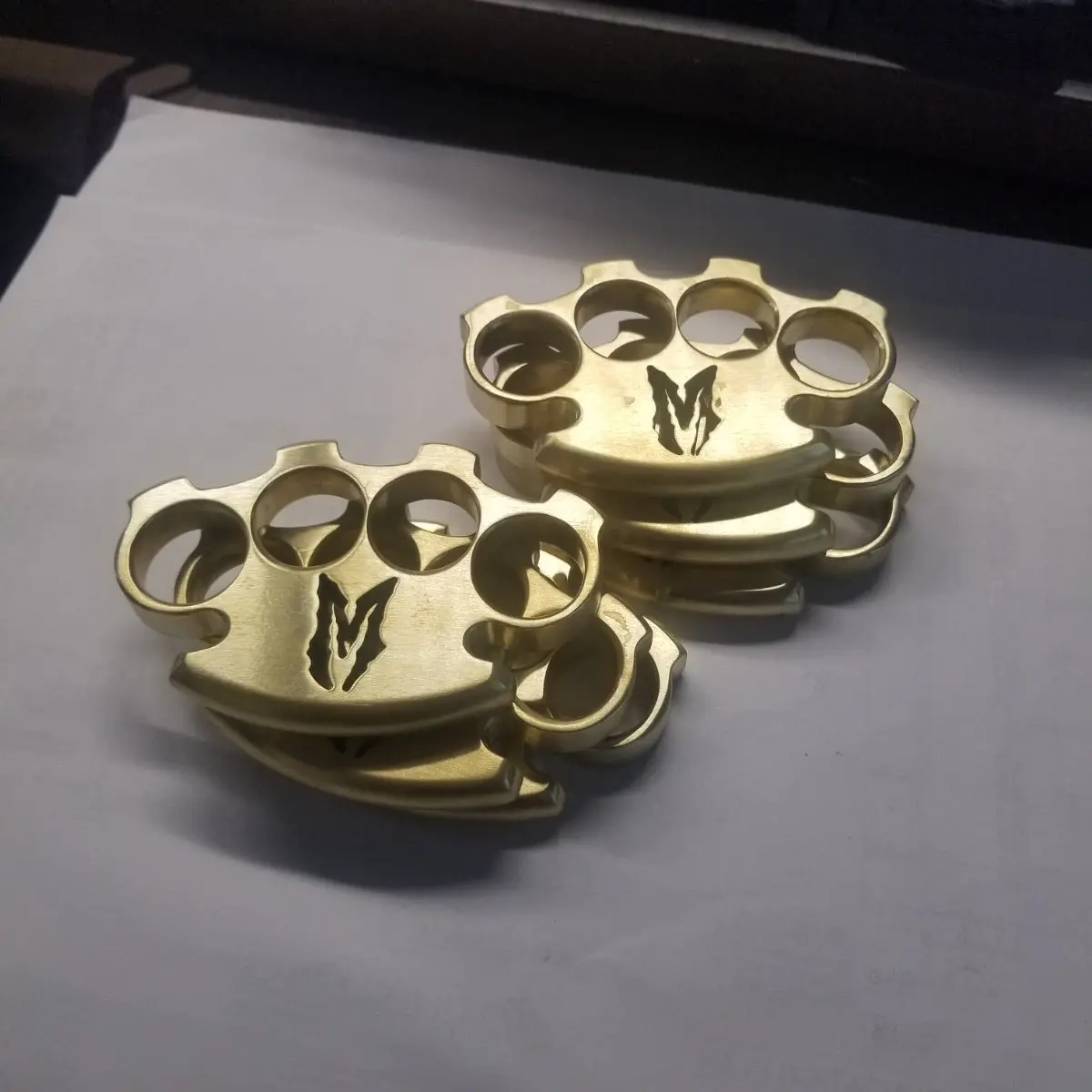 **Brass Paperweight Or Knuckles** 1